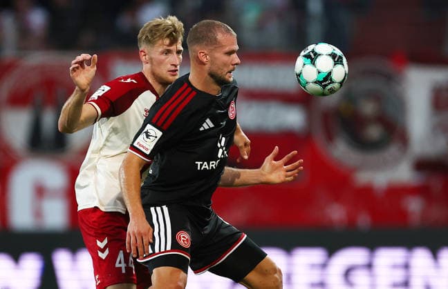 Football german 3. Liga Jahn Regensburg vs Fortuna Dusseldorf Karbstein Malte of Regensburg ( L ) and Hottmann Eric of Fortuna Dusseldorf ( R ) fight for the ball during the 3. Liga football match between Jahn Regensburg and Fortuna Dusseldorf at Jahn Stadium in Regensburg , Bayern , Germany . September 15th , 2026 Copyright: xDavidexEliasx