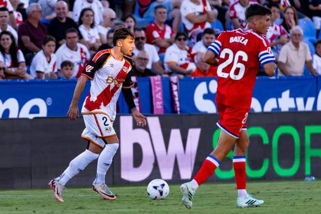 Rayo Vallecano v Espanyol - La Liga EA Sports 2026 27 September 15, 2026, Estadio Butarque, Leganes, Madrid, Spain: Andrei Ratiu is defended by Rafael Bauza of Espanyol during La Liga EA Sports match between Rayo Vallecano and Espanyol at Estadio Butarque on September 15, 2026 in Leganes, Madrid, Spain. Leganes Estadio Butarque Madrid Spain Copyright: xAlejandroxMatiasxAcostax