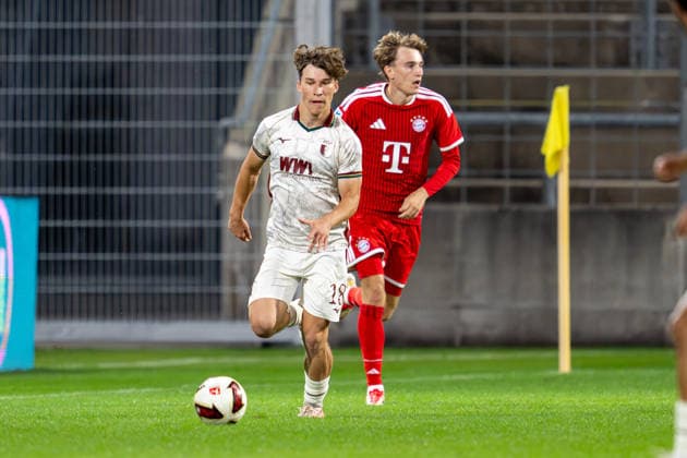 Jonas Ruf 18 (FC Augsburg II), Artur Degraf 7 (FC Bayern Muenchen Amatuere), FC Bayern II vs. FC Augsburg II, Fussball, Regionalliga Bayern, 9. Spieltag, 15.09.2026 DFB regulations prohibit any use of photographs as image sequences and or quasi-video Muenchen Bayern Deutschland