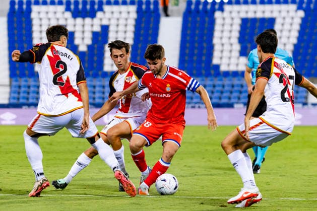Rayo Vallecano v Espanyol - La Liga EA Sports 2026 27 September 15, 2026, Estadio Butarque, Leganes, Madrid, Spain: Javier Hernandez of Espanyol is defended by Pedro Diaz; Andrei Ratiu and Oscar Valentin of Rayo Vallecano during La Liga EA Sports match between Rayo Vallecano and Espanyol at Estadio Butarque on September 15, 2026 in Leganes, Madrid, Spain. Leganes Estadio Butarque Madrid Spain Copyright: xAlejandroxMatiasxAcostax