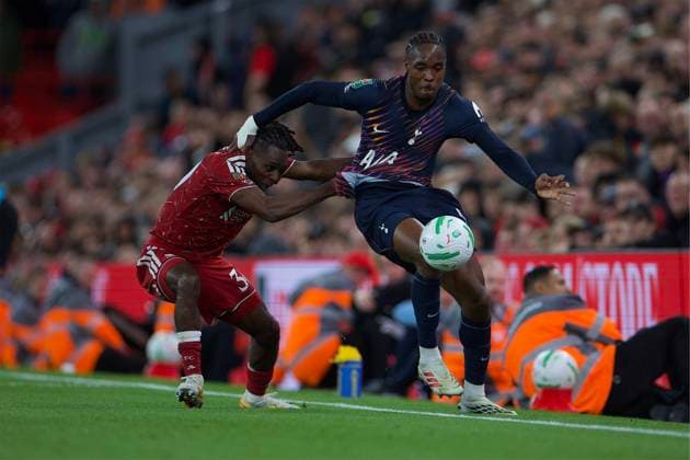 RECORD DATE NOT STATED Football - Football League Cup - 3rd Round - Liverpool FC v Tottenham Hotspur g LIVERPOOL, ENGLAND - Tuesday, September 15, 2026: Liverpool s Jeremie Frimpong challenges Tottenham Hotspur s Mathys Tel (L) during the Football League Cup 3rd Round match between Liverpool FC and Tottenham Hotspur FC at Anfield. (Photo by David Rawcliffe Propaganda) LIVERPOOL Anfield MERSEYSIDE ENGLAND  Copyright: xDavidxRawcliffex 2026-09-15-Liverpool_v_Tottenham-062