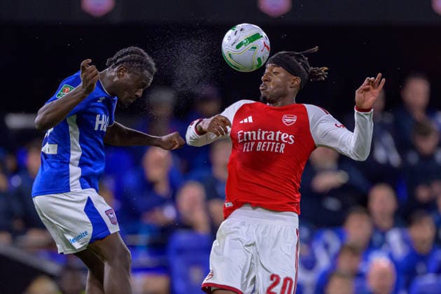 IPSWICH, ENGLAND SEPTEMBER 15 - Abdoul Ouattara of Ipswich Town and Noni Madueke of Arsenal during the Carabao Cup game between Ipswich Town and Arsenal at Portman Road on September 15, 2026 in Ipswich, England. (Photo by Keeran Marquis Sports Press Photo)  Copyright: xKeeranxMarquis SPPx Sportspressphoto_SPR231612