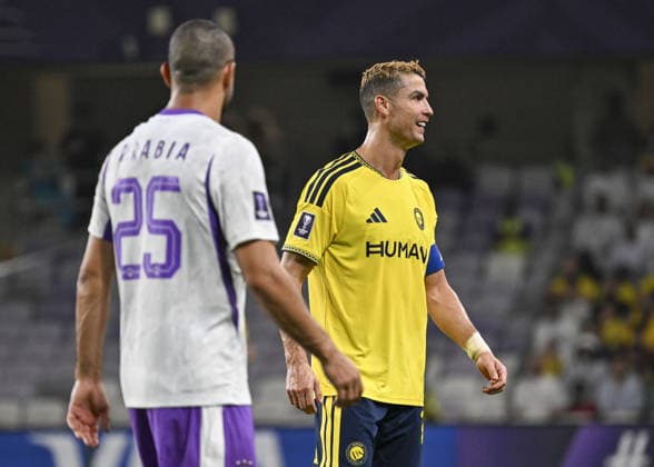 Al Ain v Al-Nassr - AFC Champions League AL AIN, UNITED ARAB EMIRATES - SEPTEMBER 15: Cristiano Ronaldo (R) of Al-Nassr in action during the AFC Champions League match between Al Ain and Al-Nassr at Hazza Bin Zayed Stadium in Al Ain, United Arab Emirates, on September 15, 2026. Hassan al Raisi Anadolu Abu Dhabi United Arab Emirates. Editorial use only. Please get in touch for any other usage.  Copyright: x2026xAnadoluxHassanxalxRaisix