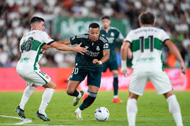 September 15, 2026, Elche, Elche, Spain: Kylian Mbappe of Real Madrid CF and Martim Neto of Elche CF compete for the ball during the Spanish League, LaLiga EA Sports, football match played between Elche CF and Real Madrid CF at Estadio Manuel Martinez Valero on September 15, 2026, in Elche, Spain. Elche Spain - ZUMAa181 20260915_zaa_a181_289 Copyright: xDennisxAgyemanx