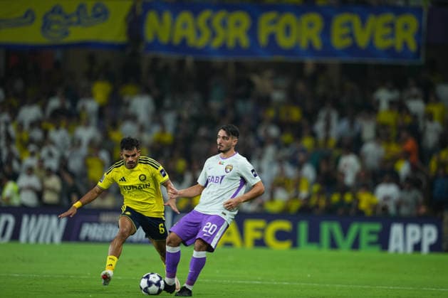 AL AIN, UNITED ARAB EMIRATES - SEPTEMBER 15: Matias Palacios of Al-Ain FC and Saad Al-Nasser of Al-Nassr FC during the AFC Champions League Elite group stage match between Al Ain FC and Al Nassr at the Hazza bin Zayed Stadium on September 15, 2026 in Al Ain, United Arab Emirates. Al Ain vs. Al- Nassr - 2026 27 AFC Champions League Elite match 1 of 8 - West Region group at Hazza bin Zayed Stadium, Al Ain, UAE. 15 SEPTEMBER 2026 Copyright: xx