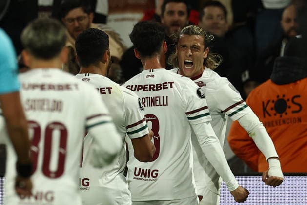 Fluminense s Uruguayan forward Agustin Canobbio (R) celebrates with teammates after scoring a goal during the second leg of the CONMEBOL Copa Libertadores quarter-final match between Platense of Argentina and Fluminense of Brazil, at Ciudad de Vicente Lopez Stadium in Buenos Aires, Argentina, on September 15, 2026. Fluminense won by 2-1 and qualify to semifinals. BUENOS AIRES ARGENTINA Copyright: xPHOTOXPHOTOx