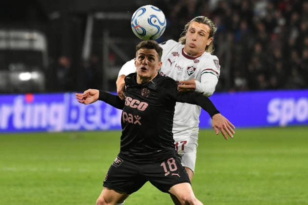 15th September 2026; Estadio Excelsior, Puerto Cortes, Honduras; CONMEBOL Libertadores Football, Platense versus Fluminense; Bautista Merlini of Platense battles for possession with Agustin Canobbio of Fluminense