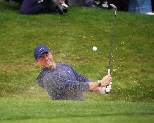 Golf - DP World Tour (European Tour) ˜Rolex Series™ - 2026 BMW PGA, Golf Herren Championship - Celebrity Pro-Am Round - West Course, Wentworth Club - Wednesday 16th September 2026 Rory McIlroy in a bunker at the 18th hole 