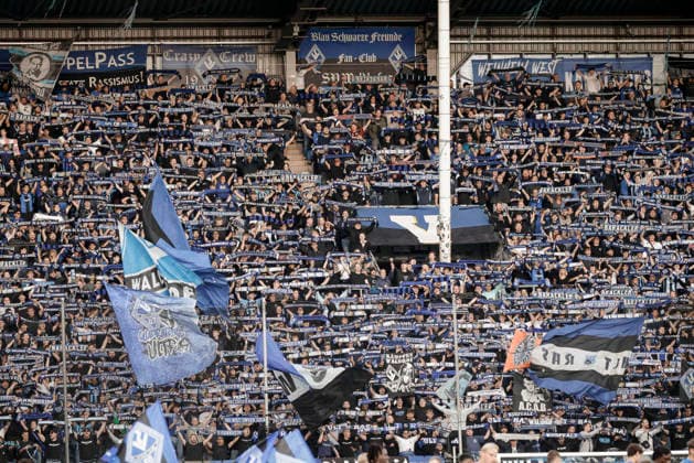 16.09.2026, xhettx, Fussball 3.Liga, SV Waldhof Mannheim - Rot-Weiss Essen v.l. Heimfans Fahnenmeer