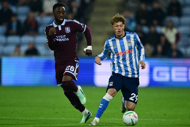 Coventry City v Aston Villa, EFL Cup Coventry City midfielder Victor Torp (29) under pressure from Aston Villa midfielder Lamare Bogarde (26) during the EFL Cup match between Coventry City and Aston Villa at the Coventry Building Society Arena, Coventry, UK on 16 September 2026. Coventry Coventry Building Society Arena West Midlands UK Editorial use only DataCo restrictions apply See www.football-dataco.com , Copyright: xDennisxGoodwinx PSI-24892-0013