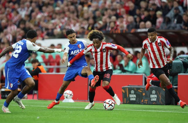 Sunderland, England, 16th September 2026. Malick Fofana (C) of Sunderland in action with Ayoub Oufkir of AZ Alkmaar during the Sunderland vs AZ Alkmaar UEFA Europa League match at the Stadium Of Light, Sunderland. Picture credit should read: Nigel Roddis Sportimage EDITORIAL USE ONLY. No use with unauthorised audio, video, data, fixture lists, club league logos or live services. Online in-match use limited to 120 images, no video emulation. No use in betting, games or single club league player publications. SPI_013_NR_SUND_AZAL SPI-5002-0013