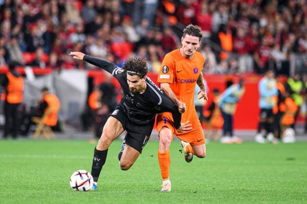 LEVERKUSEN, GERMANY - 16 SEPTEMBER, 2026: Martin Terrier of Bayer 04 Leverkusen, Germany, Benjamin Verbic of NK Celje, Slovenia - The UEFA Europa League match Bayer 04 Leverkusen vs. NK Celje at BayArena.  Copyright: xVitaliixKliuievx