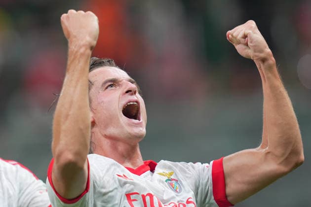 Benfica s Jakub Kaminski celebrates after scoring 0-2 during the Europa League soccer match between Ac Milan and Benfica at San Siro Stadium in Milan , Italy - September 16 , 2026. - Soccer  Copyright: xSpada LaPressex
