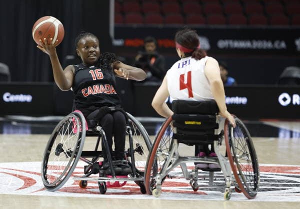 September 16, 2026, Ottawa, On, CANADA: Canada s Mercy Nyakundi (16) passes the ball as Japan s Amane Yanagimoto (4) looks on during first half of IWBF Wheelchair Basketball World Championships women s quarter-final action in Ottawa on Wednesday, Sept. 16, 2026. Canada News - September 16, 2026  - ZUMAc35_ 20260916_zaf_c35_131 Copyright: xPatrickxDoylex