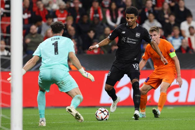 Torwart Zan-Luk Leban (NK Celje) und Malik Tillmann (Bayer 04 Leverkusen) battle for the ball during the UEFA Europa League 2026 27 League Phase match between Bayer 04 Leverkusen and NK Celje at BayArena on September 16, 2026 in Leverkusen, Germany. (Photo by Oliver Kaelke DeFodi Images) -