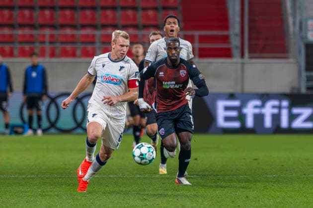 Ingolstadt, Deutschland 08. August 2026: 3. Liga - 2026 2027 - Sp. 6 - FC Ingolstadt 04 gegen TSG Hoffenheim II Im Bild: v. li. im Zweikampf Valentin Lässig Laessig (TSG II) und Josef Ganda (FCI) DFB DFL regulations prohibit any use of photographs as image sequences and or quasi-video Audi Sportpark Bayern Copyright: xFotostandx xSchäferx