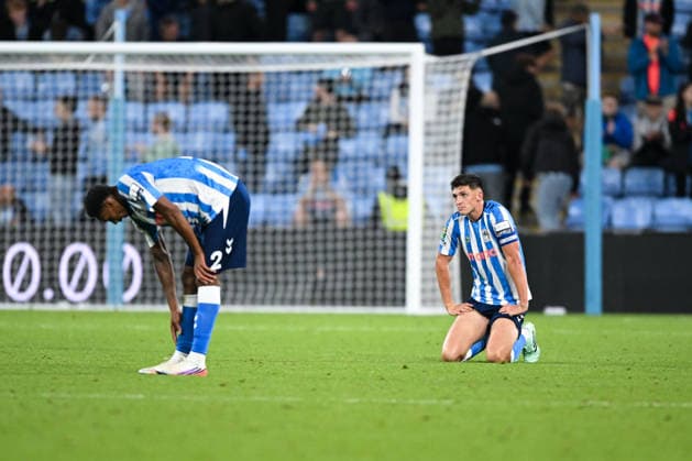 Coventry, England, 16th September 2026. Bobby Thomas of Coventry City looks dejected at full time following defeat during the Coventry City vs Aston Villa Carabao Cup match at the Coventry Building Society Arena, Coventry. Picture credit should read: Harriet Massey Sportimage EDITORIAL USE ONLY. No use with unauthorised audio, video, data, fixture lists, club league logos or live services. Online in-match use limited to 120 images, no video emulation. No use in betting, games or single club league player publications. SPI_067_HM_COV_v_Villa_160926 SPI-5000-0059