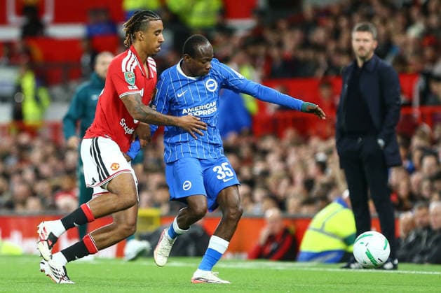 MANCHESTER, ENGLAND, SEPTEMBER 16: Leny Yoro of Manchester United, ManU (L) vies with Malick Yalcouyé of Brighton & Hove Albion (R) during a Carabao Cup Third Round match between Manchester United and Brighton & Hove Albion at the Old Trafford on September 16, 2026 in York, England. (Photo by Zach Forster Sports Press Photo) Copyright: xZachxForster SportsxPressxPhotox Sportspressphoto_SPR233124