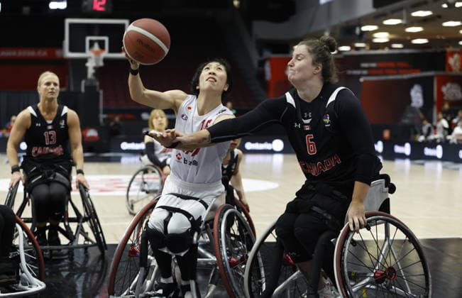September 16, 2026, Ottawa, On, CANADA: Japan s Mari Amimoto (15) shoots the ball as Canada s Arinn Young (6) tries to block during second half of IWBF Wheelchair Basketball World Championships women s quarter-final action in Ottawa on Wednesday, Sept. 16, 2026. Canada News - September 16, 2026  - ZUMAc35_ 20260916_zaf_c35_156 Copyright: xPatrickxDoylex