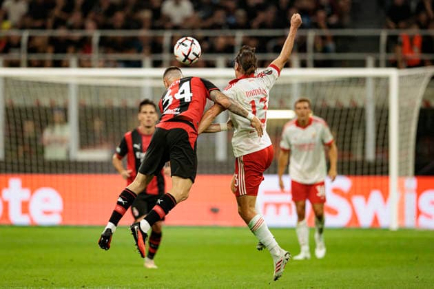 Filippo Terracciano and Jakub Kaminski seen during UEFA Europa League MD1 game between teams of AC Milan and SL Benfica (Maciej Rogowski Ball Raw Images) Milan San Siro Italy Copyright: xMaciejxRogowskix maciejrogowski_acmilan_slbenfoica_2627_5-4