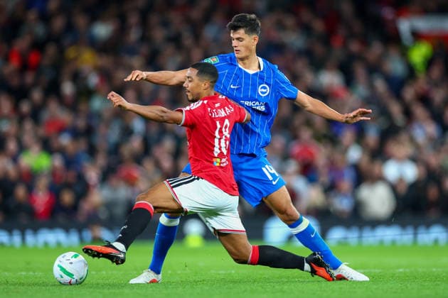 16th September 2026; Old Trafford, Manchester, England; Carabao Cup Football, Manchester United, ManU versus Brighton and Hove Albion; Youri Tielemans of Manchester United is under pressure from Chema Andres of Brighton and Hove Albion RogerxEvans