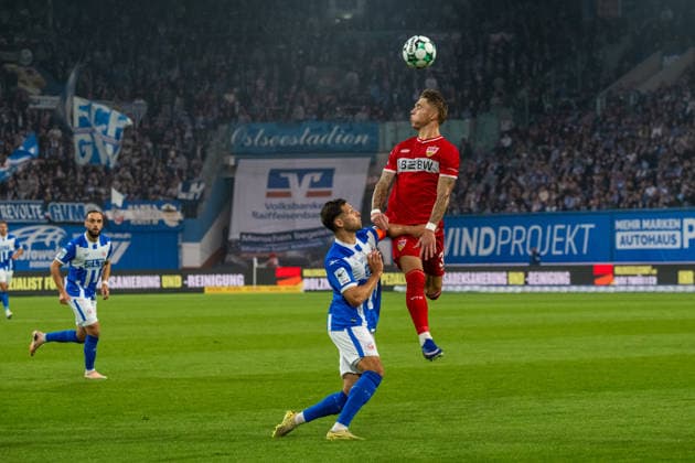 Rostock, Deutschland 16. September 2026: 3. Liga - 2026 2027 - Sp. 6 - FC Hansa Rostock gegen VfB Stuttgart II Im Bild: v. li. im Zweikampf Marco Schuster (Hansa Rostock) und Veit Stange (VfB Stuttgart II) DFB DFL regulations prohibit any use of photographs as image sequences and or quasi-video Copyright: xFotostandx xVoelkerx