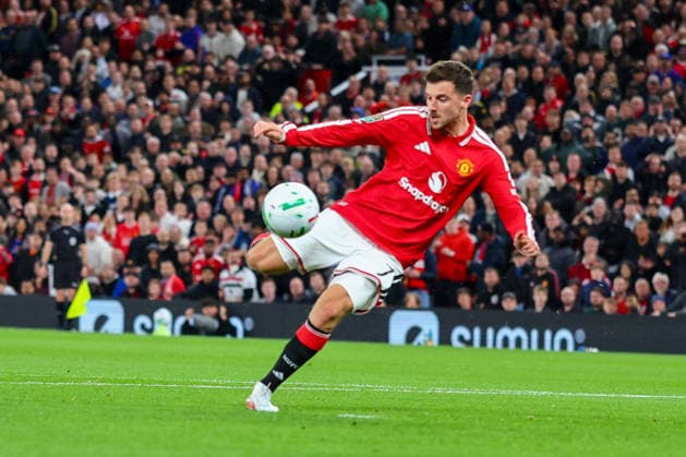 16th September 2026; Old Trafford, Manchester, England; Carabao Cup Football, Manchester United, ManU versus Brighton and Hove Albion; Mason Mount of Manchester United shoots and scores in the 10th minute to make the score 2-0 RogerxEvans
