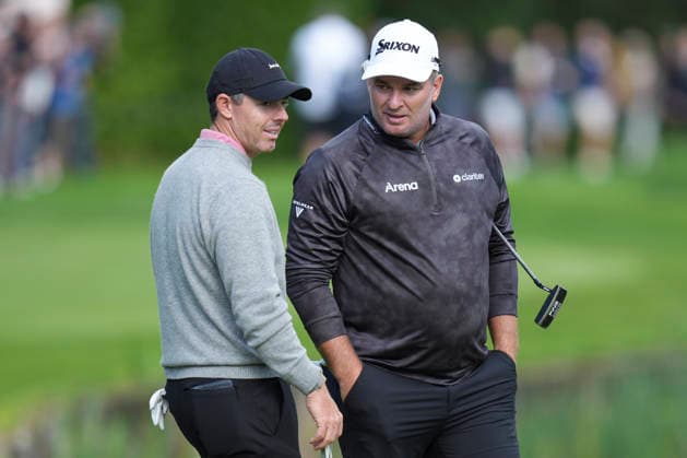 VIRGINIA WATER, ENGLAND - SEPTEMBER 17: Ryan Fox (NZL) speaks with Rory McIlroy (IRE) on the eighteenth green during Round 1 at the BMW PGA, Golf Herren Championship at Wentworth Golf Club, Virginia Water on September 17, 2026 in Surrey, England The BMW PGA Championship