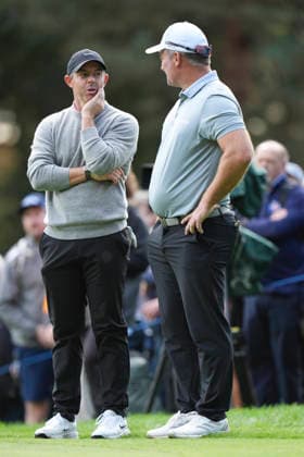 VIRGINIA WATER, ENGLAND - SEPTEMBER 17: Rory McIlroy (IRE) and Ryan Fox (NZL) talks as they wait on the first green during Round 1 at the BMW PGA, Golf Herren Championship at Wentworth Golf Club, Virginia Water on September 17, 2026 in Surrey, England The BMW PGA Championship