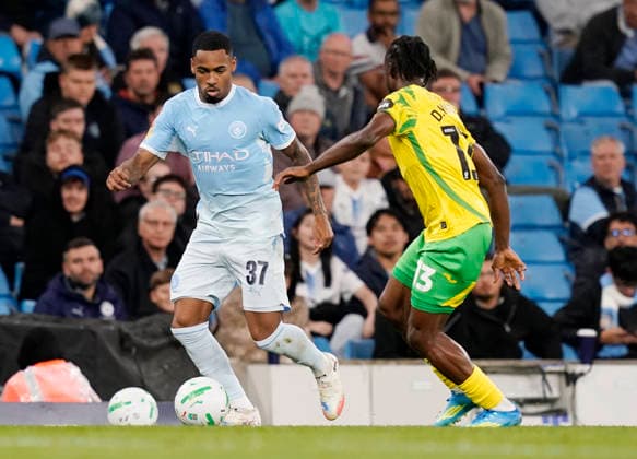 Manchester, England, 17th September 2026. Allan Elias of Manchester City tracked by Darlin Yongwa of Norwich City during the Manchester City vs Norwich City Carabao Cup match at the Etihad Stadium, Manchester. Picture credit should read: Andrew Yates Sportimage EDITORIAL USE ONLY. No use with unauthorised audio, video, data, fixture lists, club league logos or live services. Online in-match use limited to 120 images, no video emulation. No use in betting, games or single club league player publications. SPI_013_AY_Man_City_Norwich SPI-5003-0013