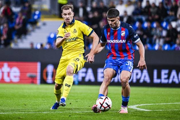 Union s Darius Olaru and Plzen s Denis Vavro pictured in action during a soccer game between Czech FC Viktoria Plzen and Belgian Royale Union Saint-Gilloise, Thursday 17 September 2026 in Plzen, Czech Republic, on the first day (out of 8) in the league phase of the UEFA Europa League competition. TOM GOYVAERTS TomxGoyvaerts  x186776554x