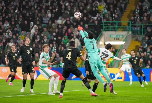 Ferencvaros goalkeeper Adam Varga punches the ball under pressure from Mika Baur of Celtic Celtic v Ferencvaros, UEFA Europa League, Football, matchday 1, Celtic Park, Glasgow, Scotland, UKGlasgow Celtic Park Scotland United Kingdom  Copyright: xStuartxWallace Shutterstockx 17156106d