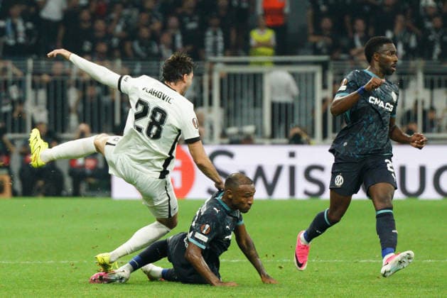 September 17, 2026, Besiktas, Istanbul, Turkey: Dusan Vlahovic (L) of Besiktas in action against Derek Cornelius (C-down) of Olympique de Marseille during the UEFA Europa League - League Phase, Matchday 1 - football match between Besiktas and Olympique de Marseille at Besiktas Park in Istanbul, Turkey, on September 17, 2026. Besiktas Turkey - ZUMAu194 20260917_zip_u194_022 Copyright: xTolgaxUluturkx