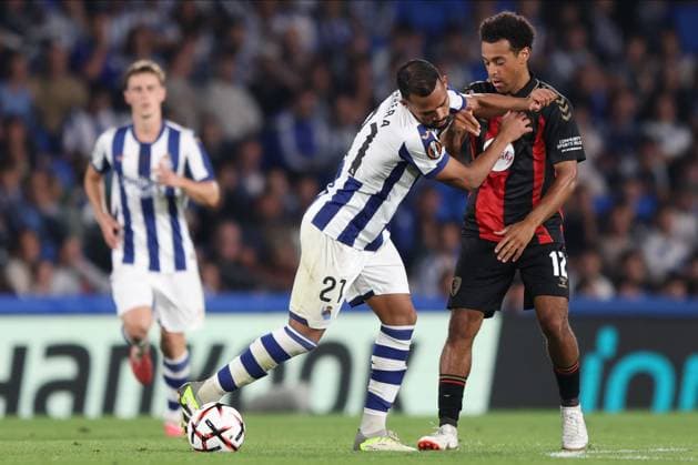 Yangel Herrera of Real Sociedad and Tyler Adams of Bournemouth in action. Real Sociedad v AFC Bournemouth, UEFA Europa League, Football, Reale Arena, San Sebastian, Spain - 17 Sep 2026San Sebastian Reale Arena Australia  Copyright: xRaddadxJebarah Shutterstockx 17155987bw
