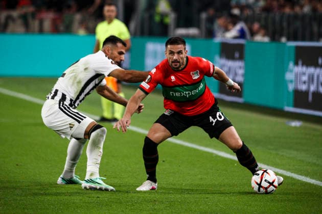 Juventus v N.E.C. Nijmegen - UEFA Europa League 2026 27 League Phase MD1 N.E.C. forward Dusan Tadic (10) fights for the ball against Juventus defender Zeki Celik (2) during the first leg of the Uefa Europa League knockout phase match between Juventus and N.E.C. at the Allianz Stadium in Turin, Piedmont, Italy, on September 17, 2026. Turin Piedmont Italy  Copyright: xMatteoxBottanellix originalFilename:bottanelli-juventus260917_np5mN.jpg