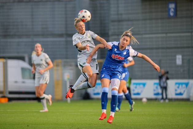 Sinsheim, Deutschland: 18.09.2026 - 1. Frauenbundesliga - 7. Spieltag - VfL Wolfsburg Frauen vs. TSG Hoffenheim Im Bild: v.li. Svenja Huth (Wolfsburg) und Janna Grimm (Hoffenheim) im Kopfballduell Copyright: HMBxMedia MadeleinexFantini