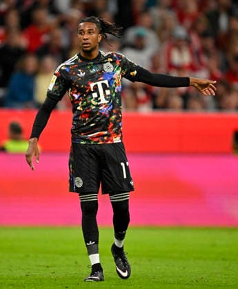 18.09.2026, Fussball Bundesliga 2026 2027, 4.Spieltag, FC Bayern München - 1.FC Union Berlin, in der Allianz-Arena München, Michael Olise (FC Bayern München) mit dem Wiesn Trikot