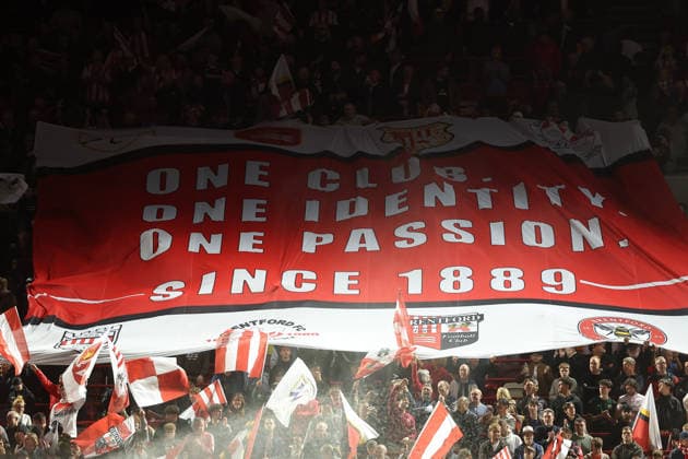 18th September 2026; Gtech Community Stadium, London, England; Premier League Football, Brentford versus Chelsea; Giant tifo banner held up by Brentford fans before the match during the pre-match light show KatiexChan