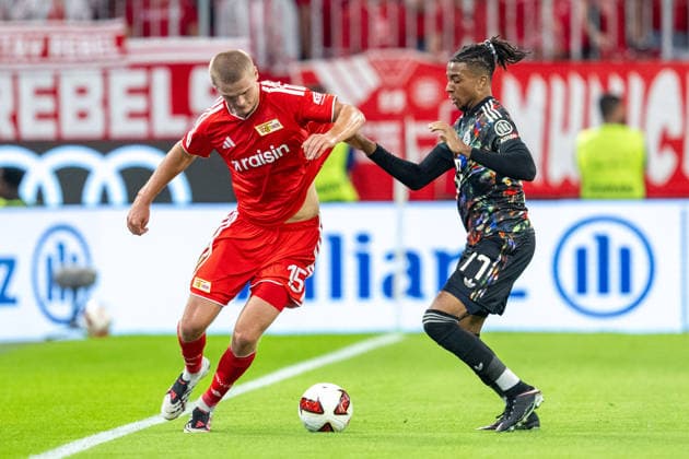 Tom Rothe 15 (1. FC Union Berlin), Michael Olise 17 (FC Bayern Muenchen), FC Bayern Muenchen - 1. FC Union Berlin, Fussball Bundesliga, 4. Spieltag, 18.09.2026 DFB regulations prohibit any use of photographs as image sequences and or quasi-video Muenchen Bayern Deutschland
