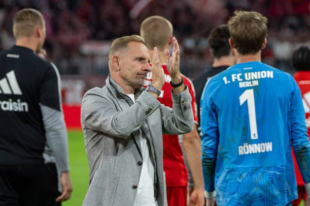 Fußball, Herren, Saison 2026 2027, 1. Bundesliga (4. Spieltag), FC Bayern München - 1. FC Union Berlin, v. l. Trainer Mauro Lustrinelli (1. FC Union Berlin), Torhüter Frederik Rönnow (1. FC Union Berlin), Enttäuschung nach Abpfiff, 18.09.2026, Copyright: xMatthiasxKochx