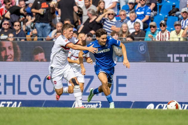 19.09.2026, xdaymx, Fussball 2.Bundesliga, Karlsruher SC - 1.FC Nürnberg. =vl. Finn Becker (1.FC Nürnberg) und Pinto, Pedrosa Rafael (Karlsruher SC) (DFL DFB REGULATIONS PROHIBIT ANY USE OF PHOTOGRAPHS as IMAGE SEQUENCES and or QUASI-VIDEO) Karlsruhe