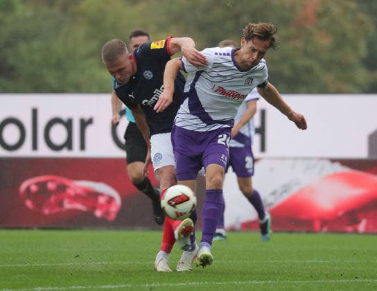 Phil Harres (Holstein Kiel), Jannik Mueller (VfL Osnabrueck) Fussball, Herren, Saison 2026 2027, 2.BL, Holstein Stadion, Holstein Kiel gegen VfL Osnabrueck DFL REGULATIONS PROHIBIT ANY USE OF PHOTOGRAPHS AS IMAGE SEQUENCES AND OR QUASI-VIDEO.