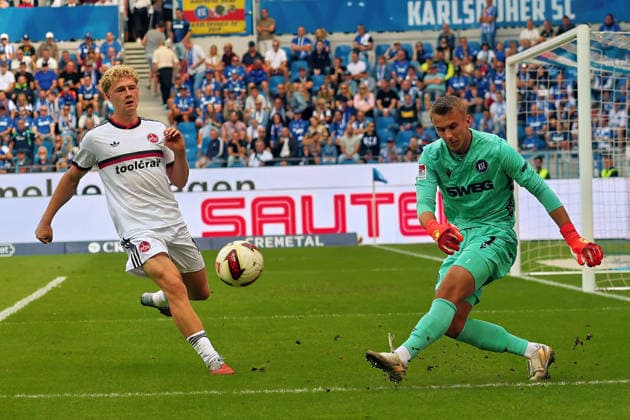 Christian Bernat Hans (Karlsruher SC , 1) bei abwehren. GER, SC Karlsruhe - FC Nürnberg Fussball 6.Spieltag Spielzeit 2026 2027 2.Bundesliga 19.09.2026 (DFL DFB REGULATIONS PROHIBIT ANY USE OF PHOTOGRAPHS as IMAGE SEQUENCES and or QUASI-VIDEO). GER SC Karlsruhe - FC NÂ¸rnberg Fussball 6.Spieltag Spielzeit 2026 2027 19.09.2026 Copyright: xEibner-Pressefoto JoergxHirschx EP_JHH