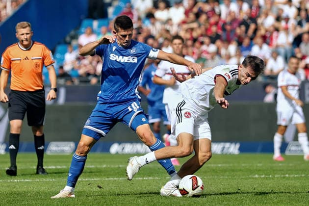 v. li. im Zweikampf, Marvin Wanitzek (SC Karlsruhe, 10),Adam Markhiyev (FC Nuernberg, 6) GER, SC Karlsruhe - FC Nürnberg Fussball 6.Spieltag Spielzeit 2026 2027 2.Bundesliga 19.09.2026 (DFL DFB REGULATIONS PROHIBIT ANY USE OF PHOTOGRAPHS as IMAGE SEQUENCES and or QUASI-VIDEO). GER SC Karlsruhe - FC NÂ¸rnberg Fussball 6.Spieltag Spielzeit 2026 2027 19.09.2026 Copyright: xEibner-Pressefoto JoergxHirschx EP_JHH
