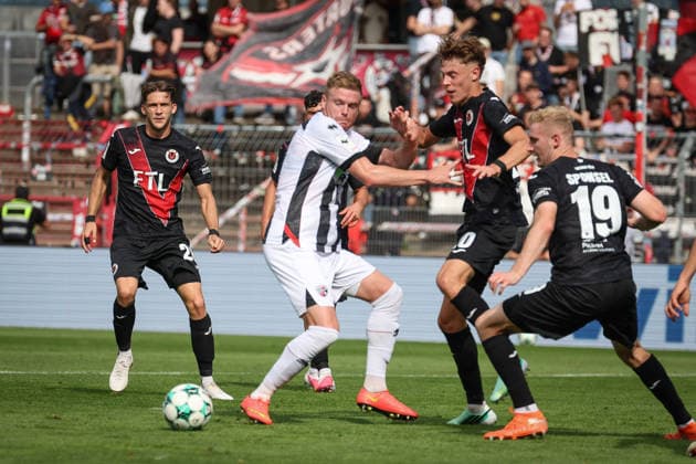 3. Liga - Saison 2026 27 - Victoria Köln - FC Ingolstadt 04 - Lars Lokotsch (Nr.13 - FCI) - Niklas Swider (Nr.20 - Viktoria Köln) - Meiko Sponsel (Nr.19 - Viktoria Köln) - Foto: Meyer Jürgen 3. Liga - Saison 2026 27 - Victoria Köln - FC Ingolstadt 04