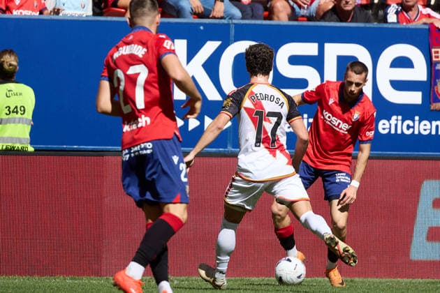 LaLiga EASports 2026 27 CA Osasuna v Rayo Vallecano Jonathan Dubasin (21. OSA) (R) dribbles past Adria Pedrosa (17. RAY) (L) during the football match of LaLiga EA Sports between CA Osasuna and Rayo Vallecano played at El Sadar stadium in Pamplona (Spain) on Sep 19 2026. Inigo Arguibide (27. OSA) is also visible in the image. Credit: Inigo Alzugaray Agencia LOF Pamplona LaLiga EASports 2026 27 CA Osasuna v Rayo Vallecano Copyright: xINIGOxALZUGARAYx
