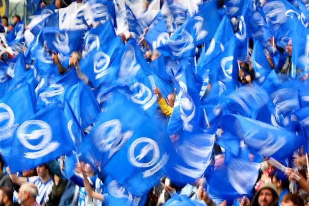 Fans wave flags before kick off. Brighton & Hove Albion v Arsenal, Premier League, Football, American Express Stadium, Brighton, UK - 19 Sep 2026Brighton American Express Stadium United Kingdom EDITORIAL USE ONLY No use with unauthorised audio, video, data, fixture lists, club league logos or live services. Online in-match use limited to 120 images, no video emulation. No use in betting, games or single club league player publications. Copyright: xJamesxMarsh Shutterstockx 17158687ad