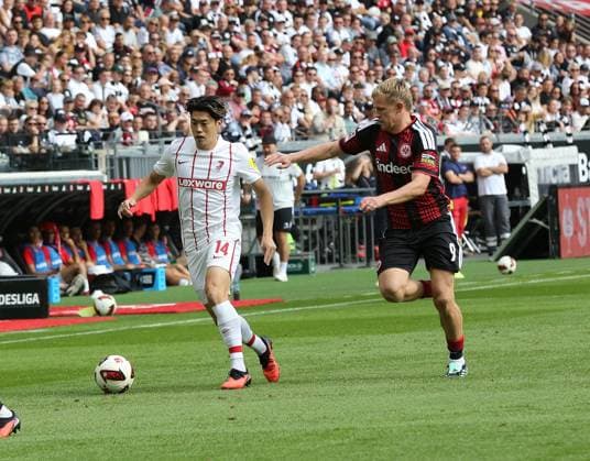 19.09.2026 xmgoodx Frankfurt am Main, Deutsche Bank Park Bundesliga Saison 2026 2027 Eintracht Frankfurt - SC Freiburg Jonathan Burkhardt (9, Eintracht Frankfurt) gegen Yuito Suzuki (Freiburg) DFL DFB REGULATIONS PROHIBIT ANY USE OF PHOTOGRAPHS AS IMAGE SEQUENCES AND OR QUASI-VIDEO.