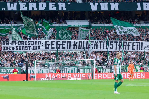 Die Fans von Werder Bremen protestieren mit einem Banner gegen Kollektivstrafen waehrend des spiels der 1. Bundesliga zwischen SV Werder Bremen und FC Augsburg, Weserstadion am 19. September 2026 in Bremen, Deutschland. (Foto von Marco Steinbrenner DeFodi Images) +++ Werder Bremen fans are protesting against collective punishments with a banner during the Bundesliga match between SV Werder Bremen and FC Augsburg at Weserstadion on September 19, 2026 in Bremen, Germany. (Photo by Marco Steinbrenner DeFodi Images) DFB DFL REGULATIONS PROHIBIT ANY USE OF PHOTOGRAPHS AS IMAGE SEQUENCES AND OR QUASI-VIDEO. (Photo by Marco Steinbrenner DeFodi Images) -