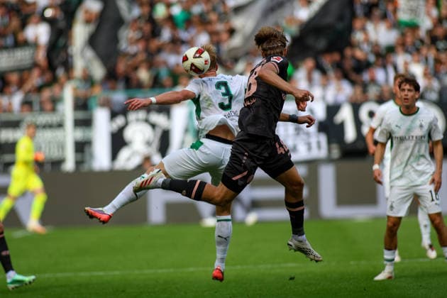 19.09.2026, GER, Fussball, Herren, Bundesliga , 1. Bundesliga, Saison 2026 2027, VfL Borussia Mönchengladbach - FSV Mainz 05 Isac Lidberg (BMG) und Kacper Potulski (M05) im Kampf um den Ball Copyright: xSvenxHanischx